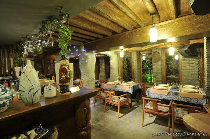 Blossom Hill Inn - Neverland 麗江市 レストラン 写真