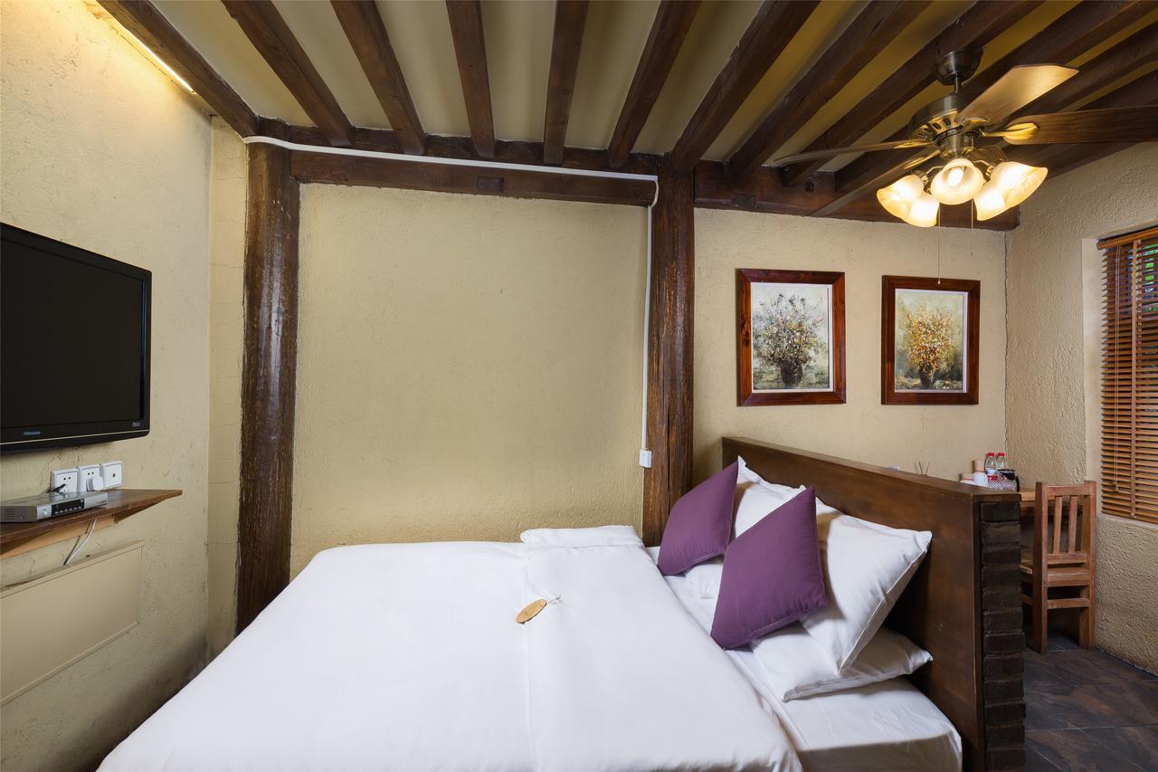 Blossom Hill Inn - Neverland 麗江市 エクステリア 写真